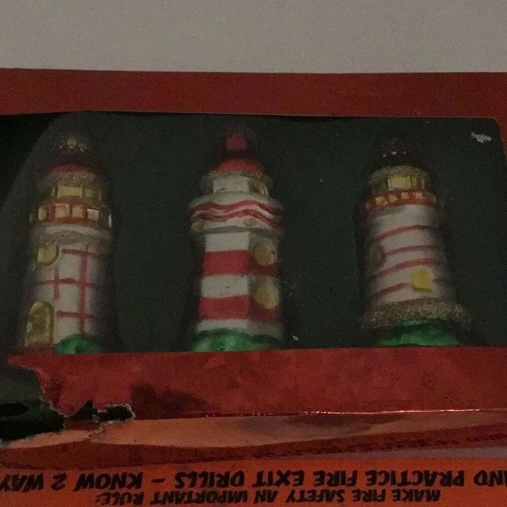 Set of three glass lighthouse ornaments